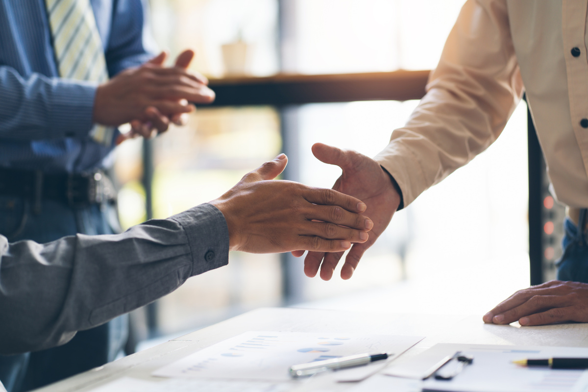 two people shaking hands